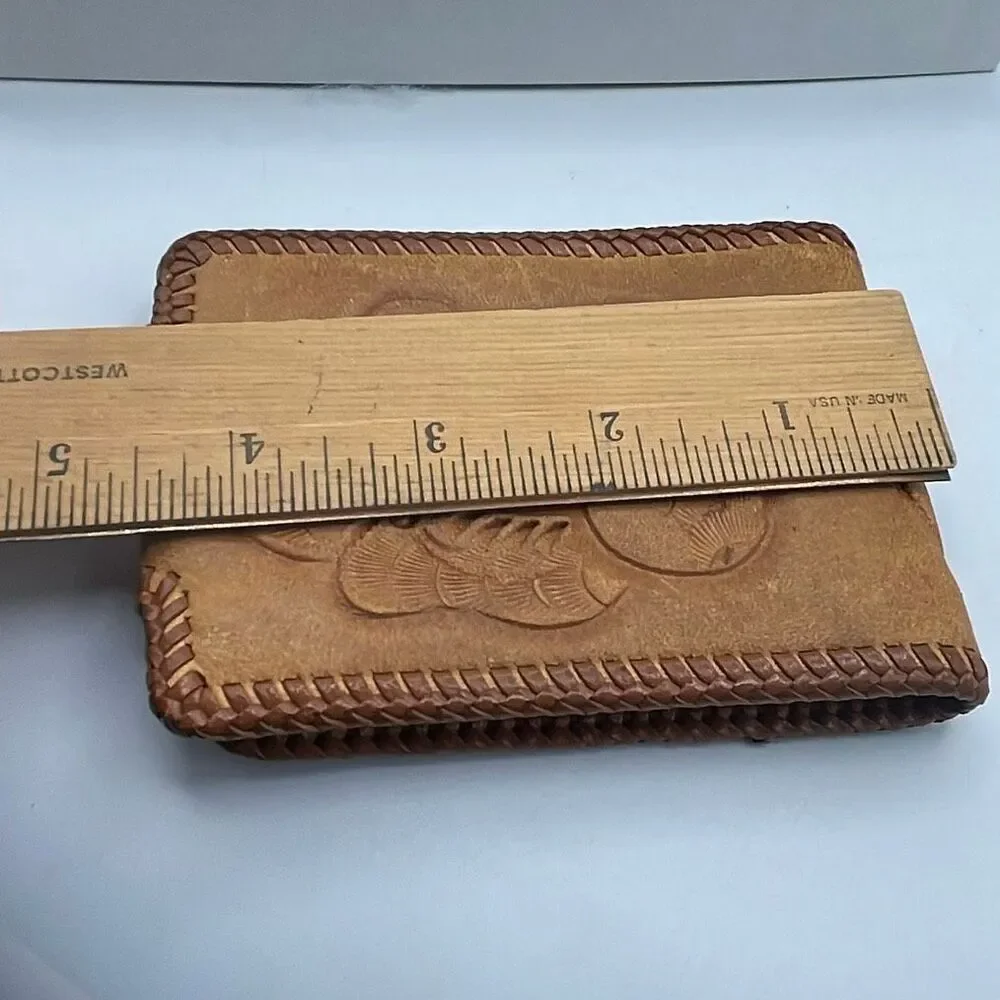 Vintage Handtooled leather Men’s wallet .
